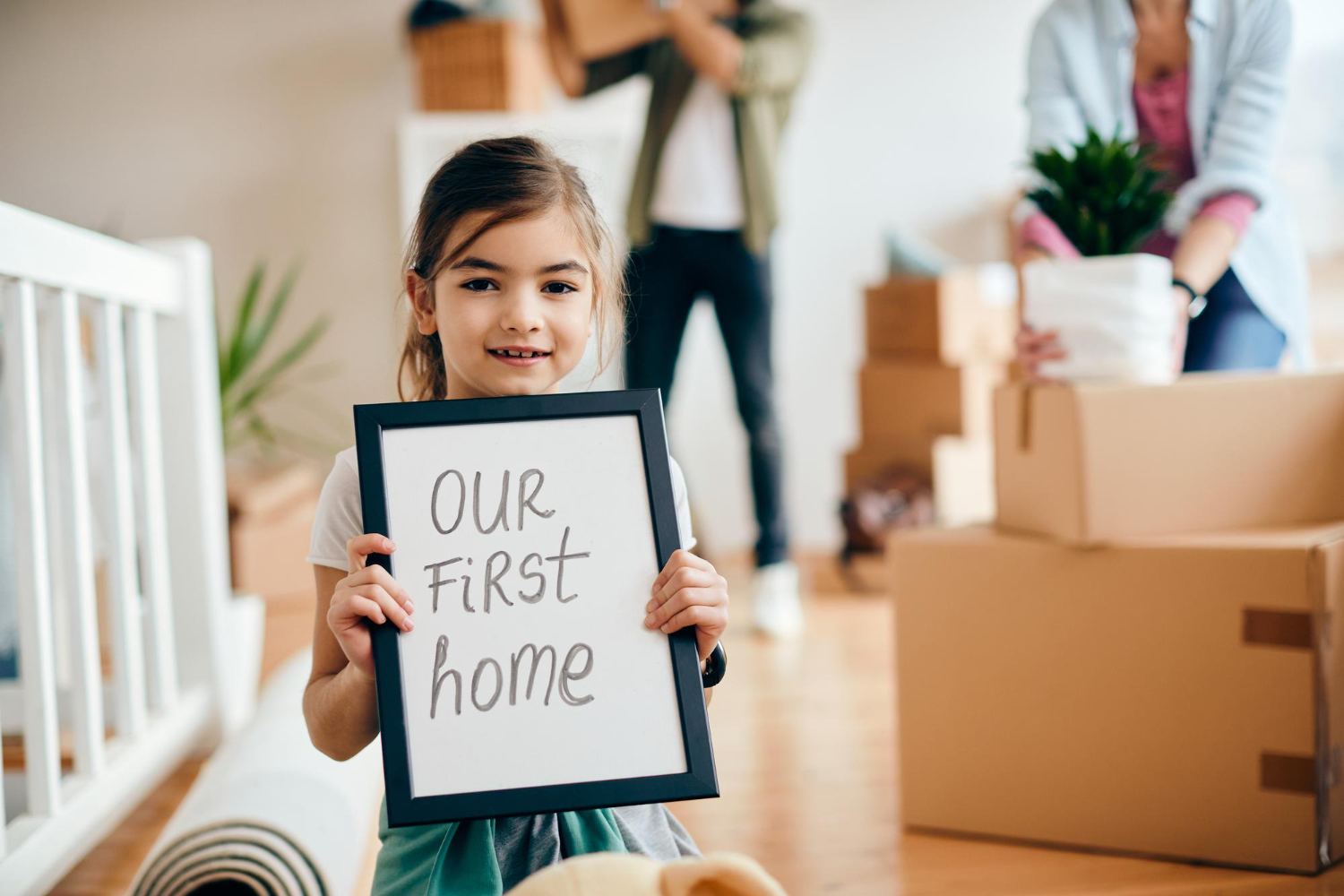 https://manilaw.ca/wp-content/uploads/2023/07/happy-little-girl-her-parents-moving-into-their-new-home.jpg